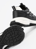 Sneakers nere con inserti decorativi