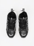 Sneakers nere con inserti decorativi