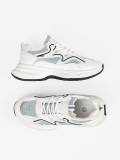 Sneakers bianche-verdi con inserti decorativi