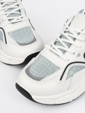 Sneakers bianche-verdi con inserti decorativi