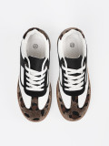 Sneakers bianco-neri con dettagli leopardati