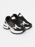 Sneakers nere con dettagli dorati
