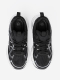 Sneakers nere con tomaia traspirante e suola bianca massiccia