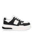 Sneakers neri e bianchi alla moda con suola spessa