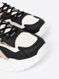 Sneakers nere e beige da donna con suola spessa