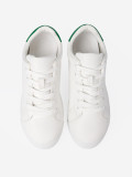 Sneakers bianchi classici con accento verde