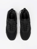Sneakers nere sportive con suola bianca spessa