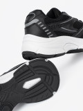 Sneakers nere con rete e suola bianca