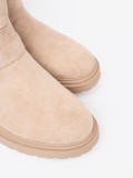 Stivaletti beige eleganti con fibbie decorative