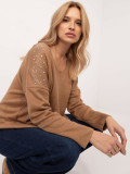 Maglione elegante con applicazione
