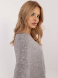Pullover grigio elegante con applicazione