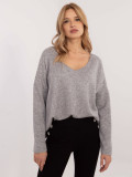 Pullover grigio elegante con applicazione