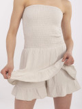 Salopette beige con volant