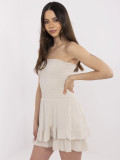 Salopette beige con volant