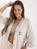 Camicia beige con cappuccio