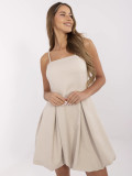 Abito cocktail beige con spalline regolabili