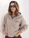 Felpa corta beige con cappuccio e zip