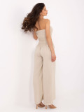 Tuta beige con gambe larghe