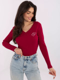 Blusa bordeaux con ricamo e scollo a V