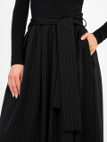 Gonna midi nera elegante con cintura e tasche