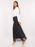 Gonna midi nera a pois con pizzo