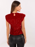 Elegantna crvena bluza s aplikacijom od šljokica