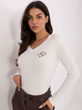 Blusa bianca ricamata con scollo a V