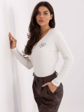 Blusa bianca ricamata con scollo a V