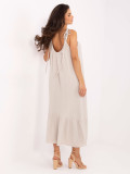 Abito beige svasato con volant