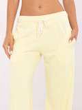 Pantaloni sportivi eleganti in giallo brillante