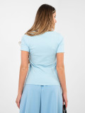 Blusa azzurro chiaro a costine con maniche corte