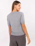 Elegante maglione grigio con applicazione