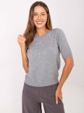 Elegante maglione grigio con applicazione