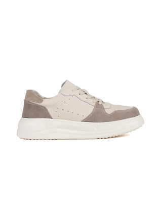 Sneakers beige in pelle con piattaforma