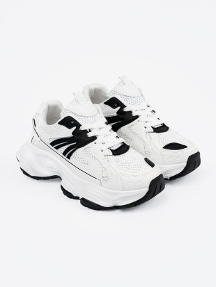 Sneakers bianche con suola spessa