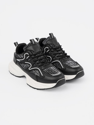 Sneakers nere con inserti decorativi