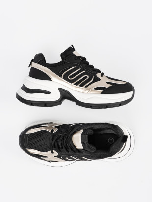 Sneakers nere con dettagli dorati
