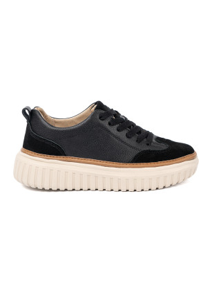 Sneakers nere in pelle su piattaforma beige
