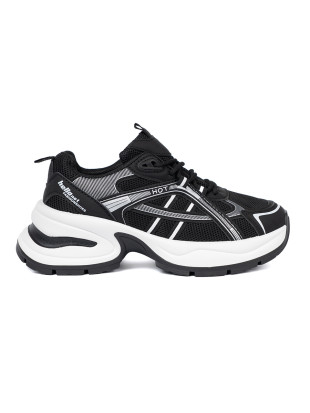 Sneakers nere con tomaia traspirante e suola bianca massiccia