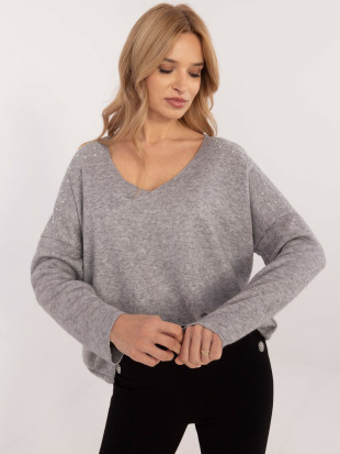 Pullover grigio elegante con applicazione