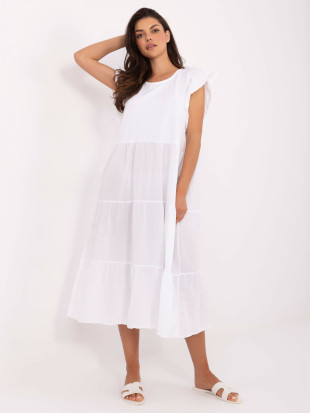 Abito bianco oversize con volant
