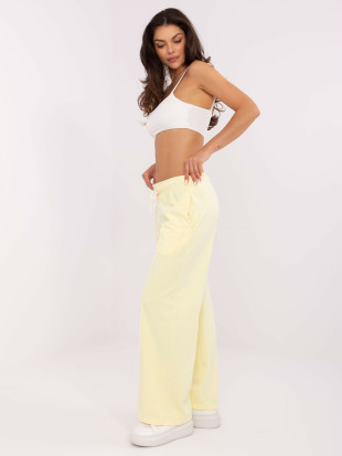 Pantaloni sportivi eleganti in giallo brillante