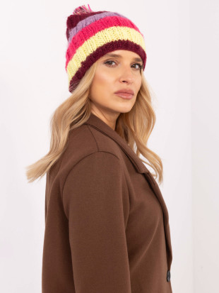 Cappello elegante con righe e pompon